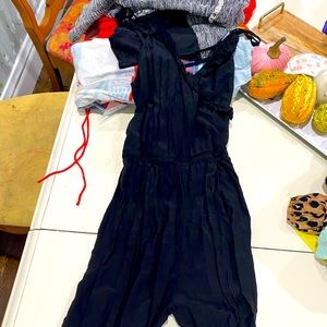 H&M black jumpsuit with top detail. Size M.
